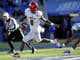 Lamar Jackson - Quarterback or Running Back?
